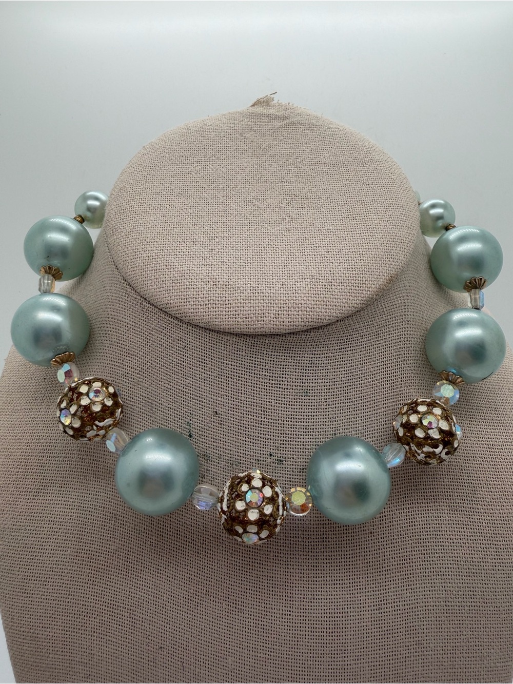 Vintage light blue plastic and metal rhinestone beaded necklace
